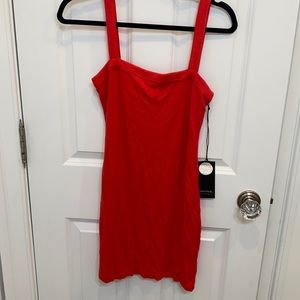 Privacy please mini dress never been worn w/ tags